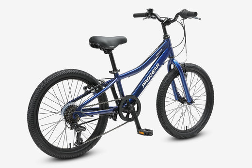 Kid riding a gear bike